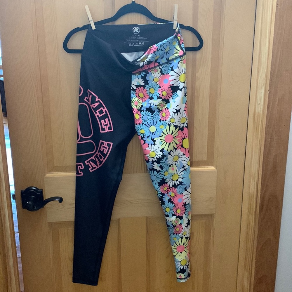NWOT. Feed Me Fight Me Leggings. Medium.